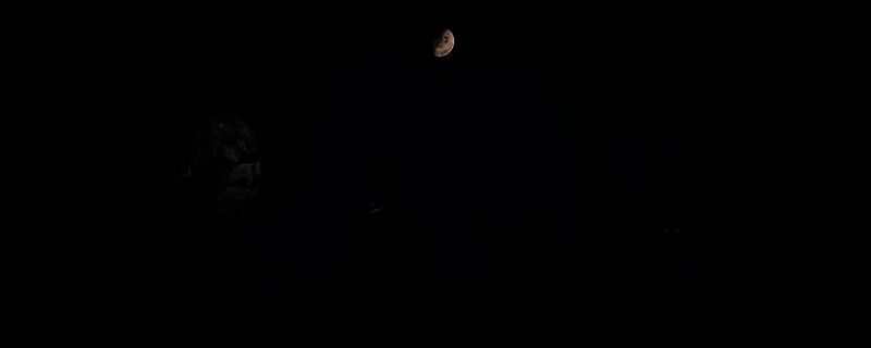 《沙丘：觉醒》游戏场景截图，展示荒漠地貌与玩家建造的基地，远处可见沙虫爬行的痕迹