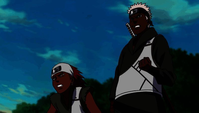 卡鲁伊与奥摩伊并肩站立，背景为忍者联军作战场景